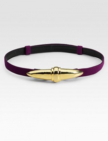 A slender cotton strap, fastened with a brilliant, sculptural clasp buckle.Goldtone buckleAdjustableCottonMade in USA A slender cotton strap, fastened with a brilliant, sculptural clasp buckle.Goldtone buckleAdjustableCottonMade in USA