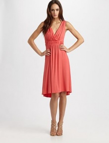 Luxe jersey knit gathers in a cinched V-neck silhouette with shirring at the bodice.V necklineSleevelessShirred empire waistSlightly gathered skirtAbout 30 from natural waist95% rayon/5% spandexMachine washMade in USA