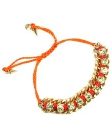 A modern take on the traditional friendship bracelet. RACHEL Rachel Roy's vivid style features bright orange cord with sparkling glass and gold-plated mixed metal accents. Bracelet adjusts up to 9 inches.