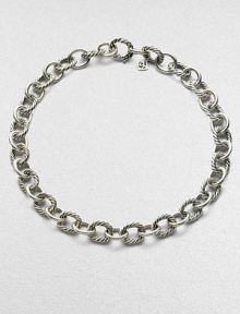 From the Oval Link Collection. Large sterling silver links alternate between smooth and cabled in a chain to wear alone or with a jeweled enhancer. Sterling silver Length, about 17½ Hidden spring clip clasp Imported From the Oval Link Collection. Large sterling silver links alternate between smooth and cabled in a chain to wear alone or with a jeweled enhancer. Sterling silver Length, about 17½ Hidden spring clip clasp Imported