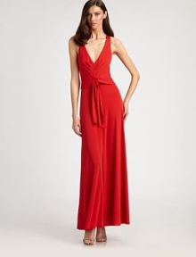 Fluid jersey, tailored with a prettily pleated bodice and alluring open back.V necklineSleevelessPleated bodiceBanded waist with front tieFront slitTwisted back strapsConcealed back zipAbout 44¾ from natural waistPolyesterDry cleanImportedModel shown is 5'10 (177cm) wearing US size Small. Fluid jersey, tailored with a prettily pleated bodice and alluring open back.V necklineSleevelessPleated bodiceBanded waist with front tieFront slitTwisted back strapsConcealed back zipAbout 44¾ from natural waistPolyesterDry cleanImportedModel shown is 5'10 (177cm) wearing US size Small.