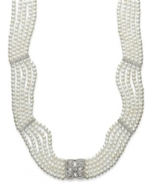 Five rows of elegance. Drape yourself in the luxury of cultured freshwater pearls (2-1/2-2-9/10 mm) with sparkling diamond stations (3/8 ct. t.w.). Necklace crafted in sterling silver. Approximate length: 11 inches + 4-inch extender. Five rows of elegance. Drape yourself in the luxury of cultured freshwater pearls (2-1/2-2-9/10 mm) with sparkling diamond stations (3/8 ct. t.w.). Necklace crafted in sterling silver. Approximate length: 11 inches + 4-inch extender.