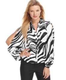 Split sleeves and a fierce zebra print elevate this button down blouse from classic and understated to modern and bold! From XOXO. Split sleeves and a fierce zebra print elevate this button down blouse from classic and understated to modern and bold! From XOXO.