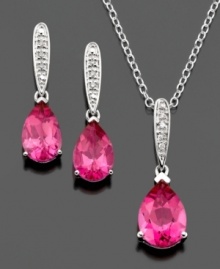 Make a charming entrance with this beautiful necklace and earrings set. Pear-cut pink topaz (6-1/3 ct. t.w.) are highlighted by round-cut diamond accents set in sterling silver. Pendant measures approximately 18 inches with a 1-inch drop. Earring drop measures approximately 3/4 inch. Make a charming entrance with this beautiful necklace and earrings set. Pear-cut pink topaz (6-1/3 ct. t.w.) are highlighted by round-cut diamond accents set in sterling silver. Pendant measures approximately 18 inches with a 1-inch drop. Earring drop measures approximately 3/4 inch.