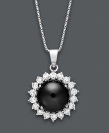 A traditional design in sweet, contrasting color. This stunning pendant highlights an onyx gemstone (10 mm) surrounded by round-cut white topaz (1 ct. t.w.). Set in sterling silver. Approximate length: 18 inches. Approximate drop: 3/4 inch. A traditional design in sweet, contrasting color. This stunning pendant highlights an onyx gemstone (10 mm) surrounded by round-cut white topaz (1 ct. t.w.). Set in sterling silver. Approximate length: 18 inches. Approximate drop: 3/4 inch.