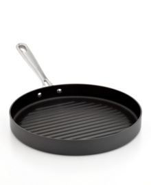 A supporting piece for a master chef. Inspired by the passion & precision of Emeril, this hard-anodized grill pan boasts an easy-release nonstick finish that expertly heats and preps your favorite dishes. Add the lid for moisture-rich, nutrient-loaded meals. Lifetime warranty. A supporting piece for a master chef. Inspired by the passion & precision of Emeril, this hard-anodized grill pan boasts an easy-release nonstick finish that expertly heats and preps your favorite dishes. Add the lid for moisture-rich, nutrient-loaded meals. Lifetime warranty.