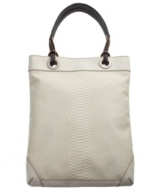 Take this tote with you for a fabulous way to store your everyday necessities. An all-over embossed python print covers this design while shiny silvertone hardware adds a posh touch. Take this tote with you for a fabulous way to store your everyday necessities. An all-over embossed python print covers this design while shiny silvertone hardware adds a posh touch.