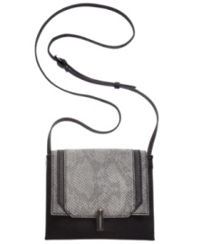 Urban cool with an uptown attitude, this petite pretty from RACHEL Rachel Roy works city girl chic. With python-embossed detailing and versatile crossbody strap, it's outfitted to explore any avenue. Urban cool with an uptown attitude, this petite pretty from RACHEL Rachel Roy works city girl chic. With python-embossed detailing and versatile crossbody strap, it's outfitted to explore any avenue.