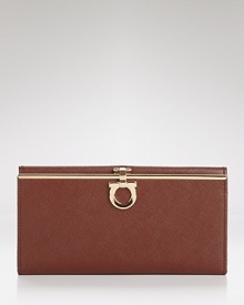 Pulled together perfection starts with practical accessories like this leather wallet from Salvatore Ferragamo. It's a beautiful accompaniment for every look with plenty of pockets to keep the essentials in place. Pulled together perfection starts with practical accessories like this leather wallet from Salvatore Ferragamo. It's a beautiful accompaniment for every look with plenty of pockets to keep the essentials in place.