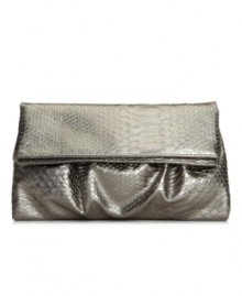 Add a pop of color and texture to your evening look with this fresh elongated clutch from Style&Co. Add a pop of color and texture to your evening look with this fresh elongated clutch from Style&Co.