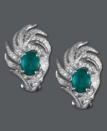 Get swept up in the glamour. Effy Collection's stunning leaf-shaped stud earrings feature beautiful oval-cut emeralds (2-1/4 ct. t.w.) and round-cut diamonds (5/8 ct. t.w.). Set in 14k white gold with an omega backing. From Brasilica by Effy. Approximate drop length: 9/10 inch. Approximate drop width: 2/3 inch. Get swept up in the glamour. Effy Collection's stunning leaf-shaped stud earrings feature beautiful oval-cut emeralds (2-1/4 ct. t.w.) and round-cut diamonds (5/8 ct. t.w.). Set in 14k white gold with an omega backing. From Brasilica by Effy. Approximate drop length: 9/10 inch. Approximate drop width: 2/3 inch.