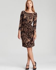 Graphic leaf print infuses a classic AK Anne Klein faux-wrap dress with modern sophistication. Garnish with gold accents for day-to-night polish.