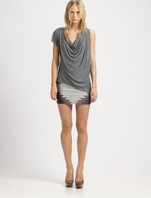A curve-hugging silhouette in soft-stretch fabric, finished with a front-to-back geometric pattern. Fitted throughout the hips and thighsPaneled constructionSide zipAbout 13 longRayonDry cleanImportedModel shown is 5'11 (180cm) wearing US size Small. A curve-hugging silhouette in soft-stretch fabric, finished with a front-to-back geometric pattern. Fitted throughout the hips and thighsPaneled constructionSide zipAbout 13 longRayonDry cleanImportedModel shown is 5'11 (180cm) wearing US size Small.