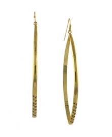 Intergalactic glamour. These other-worldly earrings by BCBGeneration take traditional hoop earrings and throw in a modern twist with the addition of sparkling jet glass accents. Crafted in antique gold tone mixed metal. Approximate diameter: 3 inches. Intergalactic glamour. These other-worldly earrings by BCBGeneration take traditional hoop earrings and throw in a modern twist with the addition of sparkling jet glass accents. Crafted in antique gold tone mixed metal. Approximate diameter: 3 inches.