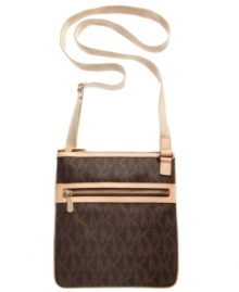 Add some signature style to your accessories arsenal with this logo print design from MICHAEL Michale Kors. Outfitted with the iconic MK monogram and convenient crossbody strap, it's the perfect finish to your everyday look. Add some signature style to your accessories arsenal with this logo print design from MICHAEL Michale Kors. Outfitted with the iconic MK monogram and convenient crossbody strap, it's the perfect finish to your everyday look.