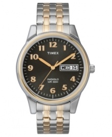 Stoic and handsome, this Timex watch features a goldtone and silvertone stainless steel expansion bracelet and round mixed case. Charcoal dial with goldtone numerals, logo and date window. Analog movement. Water resistant to 30 meters. One-year limited warranty.