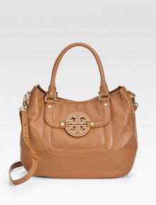 Soft and slouchy leather makes up this roomy carryall, adorned with iconic logo hardware.Double top handles, 7 drop Adjustable shoulder strap, 7-23 drop Magnetic snap closure One outside flap pocket Protective metal feet One inside zip pocket Two inside open pockets Cotton lining 14W X 11H X 4½D Imported Soft and slouchy leather makes up this roomy carryall, adorned with iconic logo hardware.Double top handles, 7 drop Adjustable shoulder strap, 7-23 drop Magnetic snap closure One outside flap pocket Protective metal feet One inside zip pocket Two inside open pockets Cotton lining 14W X 11H X 4½D Imported
