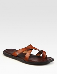 Hand burnished toe ring sandal rendered in fine Italian leather.Leather upperLeather liningPadded insoleRubber soleMade in Italy