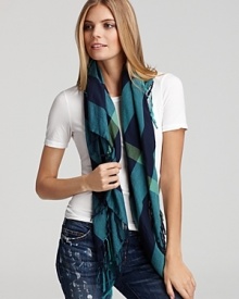 Cheerful brights dash across this classic, check printed cotton scarf from Burberry.