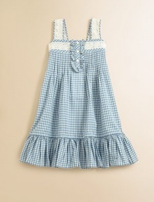 Delicate lace trim adorns the shoulder straps and neckline of this pretty A-line frock, rendered in a bright gingham check for preppy warm-weather style.Straight necklineWide shoulder strapsRuffled front button placketPintucked bodiceRear smockingFlared, ruffled hemCottonMachine washImported Please note: Number of buttons may vary depending on size ordered. Delicate lace trim adorns the shoulder straps and neckline of this pretty A-line frock, rendered in a bright gingham check for preppy warm-weather style.Straight necklineWide shoulder strapsRuffled front button placketPintucked bodiceRear smockingFlared, ruffled hemCottonMachine washImported Please note: Number of buttons may vary depending on size ordered.
