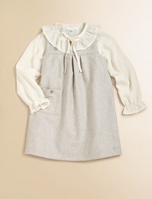 Crafted in ultra-soft, ultra-cozy wool, this simply stunning and versatile frock can be worn alone or on top of her favorite blouse.Round necklineSleevelessBack buttonsPleated empire waistButton-through patch pocketFully linedWoolDry cleanImported Please note: Number of buttons may vary depending on size ordered. Crafted in ultra-soft, ultra-cozy wool, this simply stunning and versatile frock can be worn alone or on top of her favorite blouse.Round necklineSleevelessBack buttonsPleated empire waistButton-through patch pocketFully linedWoolDry cleanImported Please note: Number of buttons may vary depending on size ordered.