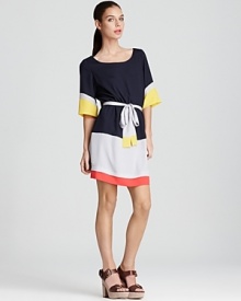 In primary hues and a kimono-inspired silhouette, this covetable Aqua color block dress makes a cheerful statement.