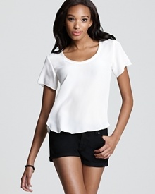 This Aqua Luxe tee reimagines the staple style with elevated details in supple silk for day-to-night chic.