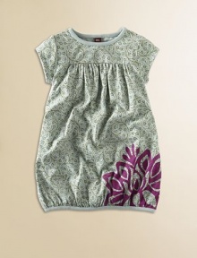 Graceful rambling vines on soft cotton jersey are boldly accented with one big, bright lotus flower at the bubble hem.Round band necklineShort sleevesYoke babydoll bodice with soft gatheringSlight bubble-shaped banded hemPullover stylingCottonMachine washImported Graceful rambling vines on soft cotton jersey are boldly accented with one big, bright lotus flower at the bubble hem.Round band necklineShort sleevesYoke babydoll bodice with soft gatheringSlight bubble-shaped banded hemPullover stylingCottonMachine washImported