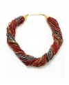 Definitely dramatic. Resplendent red, gold and hematite seed bead strands join together on Kenneth Cole New York's stunning torsade necklace, creating an elegant complement to your fall wardrobe. Crafted in mixed metal. Approximate length: 18 inches + 3-inch extension.