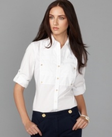Inspired by military styling, this crisp shirt from Tommy Hilfiger features a square button-down bib at the chest. Try it with a fitted blazer and skinny jeans! (Clearance) Inspired by military styling, this crisp shirt from Tommy Hilfiger features a square button-down bib at the chest. Try it with a fitted blazer and skinny jeans! (Clearance)