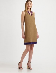 A colorful banded hemline and matching embroidery dress up this sleek, minimal sheath.Jewel neckline with U cutout detailNeckline embroidery Sleeveless Banded hemlineConcealed back zipAbout 20 from natural waist66% linen/32% cotton/2% elastaneDry cleanMade in Italy of imported fabricModel shown is 5'10½ (179cm) wearing US size 4. 