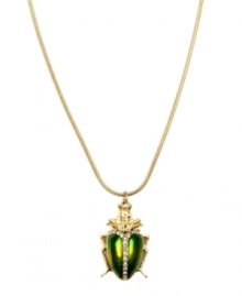 A classic symbol of good luck, RACHEL Rachel Roy's shimmering green beetle pendant will become a fave in your accessory collection. Crafted in gold-plated mixed metal with sparkling glass accents. Approximate length: 32 inches. Approximate drop: 1-1/2 inches. A classic symbol of good luck, RACHEL Rachel Roy's shimmering green beetle pendant will become a fave in your accessory collection. Crafted in gold-plated mixed metal with sparkling glass accents. Approximate length: 32 inches. Approximate drop: 1-1/2 inches.