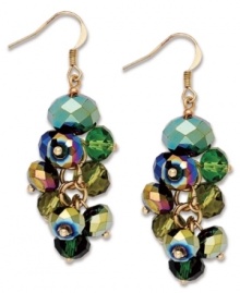 Drops of color from c.A.K.e. by Ali Khan. These stylish earrings feature clusters of beetle green glass beads in a gold tone mixed metal setting. Approximate drop: 2 inches.