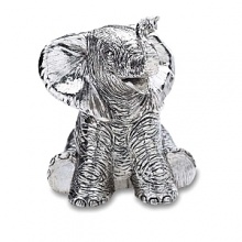With its trunk raised in song, the beautifully handcrafted Elephant music box from Reed & Barton plays Toy Symphony - perfect gift for animal lovers young and old. With its trunk raised in song, the beautifully handcrafted Elephant music box from Reed & Barton plays Toy Symphony - perfect gift for animal lovers young and old.