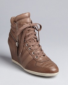 The sneaker wedge is back and Ash delivers the style with the perfect dose of edge. Pound the pavement in high style. The sneaker wedge is back and Ash delivers the style with the perfect dose of edge. Pound the pavement in high style.