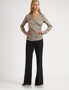 This wrap star with soft ruching is beyond lightweight...it is heavenly.V-neckRuching detailsLong sleeves with button tabs63% cotton/37% polyesterDry cleanImported Model shown is 5'10½ (179 cm) wearing US size 4. This wrap star with soft ruching is beyond lightweight...it is heavenly.V-neckRuching detailsLong sleeves with button tabs63% cotton/37% polyesterDry cleanImported Model shown is 5'10½ (179 cm) wearing US size 4.