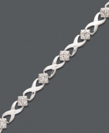 Seal the deal with a sweet kiss. Victoria Townsend's tasteful tennis bracelet features a cut-out X link design with sparkling diamond accents. Crafted in sterling silver. Approximate length: 7-1/4 inches. Seal the deal with a sweet kiss. Victoria Townsend's tasteful tennis bracelet features a cut-out X link design with sparkling diamond accents. Crafted in sterling silver. Approximate length: 7-1/4 inches.