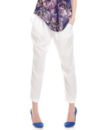 Soft to the touch and chic to the eye, these cropped trousers from GUESS? are rich in modern details -- from the crisp frontal pleats to the slimming straight leg style. Soft to the touch and chic to the eye, these cropped trousers from GUESS? are rich in modern details -- from the crisp frontal pleats to the slimming straight leg style.