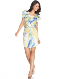 Vince Camuto's latest dress will be a bright spot in your wardrobe with its colorful print and playfully stylish silhouette.