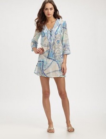 A luxurious blend of cotton and silk meets an iconic print. The lace-up neckline and side silts add an extra dose of feminine charm to this flattering coverup. V-neckThree-quarter sleevesPull-on styleSide slits68% cotton/32% silkMachine washMade in Italy A luxurious blend of cotton and silk meets an iconic print. The lace-up neckline and side silts add an extra dose of feminine charm to this flattering coverup. V-neckThree-quarter sleevesPull-on styleSide slits68% cotton/32% silkMachine washMade in Italy