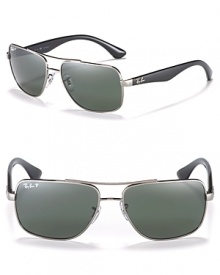 Handsome navigator sunglasses with polarized lenses for a sporty silhouette. Handsome navigator sunglasses with polarized lenses for a sporty silhouette.