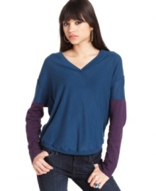 With colorblocked sleeves, this BCBGeneration sweater is perfectly slouchy for a casual-cool look!