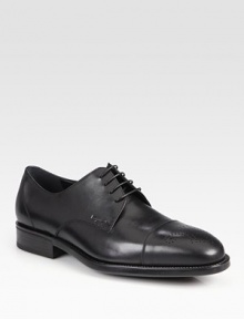 Classic captoe lace-up expertly crafted in Italy from smooth calfskin leather with perforated detail and a comfortable rubber sole.Leather upperLeather liningPadded insoleRubber soleMade in Italy