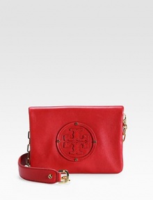 The iconic Tory logo adds a signature touch to this sleek leather bag finished with a chic chain strap.Shoulder strap,15 drop Magnetic flap closure Two zip-compartments Cotton lining with logo 8½W X 6H X 1D Imported The iconic Tory logo adds a signature touch to this sleek leather bag finished with a chic chain strap.Shoulder strap,15 drop Magnetic flap closure Two zip-compartments Cotton lining with logo 8½W X 6H X 1D Imported