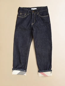 Five pocket jeans in the coolest dark denim sport turned-up check lined cuffs.Zip fly with button closure Belt loops Five-pocket styling Logo patch at back waist Cargo pocket with button closure Cotton Machine wash Imported