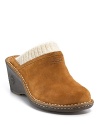 A new take on the classic clog in suede with knit cuffs and genuine shearling lining from UGG® Australia!