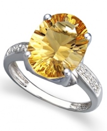 A bold burst of sunshine. Brighten any day when you don the warm tones of this oval-cut citrine ring (5-1/6 ct. t.w.). Round-cut diamond accents and a 14k white gold band add to the elegance. A bold burst of sunshine. Brighten any day when you don the warm tones of this oval-cut citrine ring (5-1/6 ct. t.w.). Round-cut diamond accents and a 14k white gold band add to the elegance.