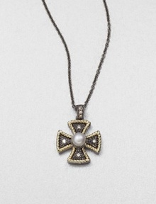 A Maltese cross in sterling silver and 18k gold accented with brilliant grey diamonds and a luminous pearl. Cultured freshwater pearlGrey diamonds, .1 tcwSterling silver18k goldLength, about 16Size, about 1Lobster clasp closureImported A Maltese cross in sterling silver and 18k gold accented with brilliant grey diamonds and a luminous pearl. Cultured freshwater pearlGrey diamonds, .1 tcwSterling silver18k goldLength, about 16Size, about 1Lobster clasp closureImported