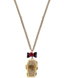 Think outside the box with this coffin pendant necklace from Betsey Johnson. Crafted from gold-tone mixed metal and featuring bow and flower details, as well as glass crystal accents, the necklace buries conventional notions of style. Approximate length: 35 inches + 3-inch extender. Approximate drop: 2-1/3 inches.