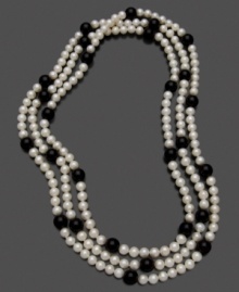 Lend a little contrast to your look with this luxe onyx (10-11 mm) and freshwater pearl (8-9 mm) necklace. Approximate length: 64 inches. Lend a little contrast to your look with this luxe onyx (10-11 mm) and freshwater pearl (8-9 mm) necklace. Approximate length: 64 inches.
